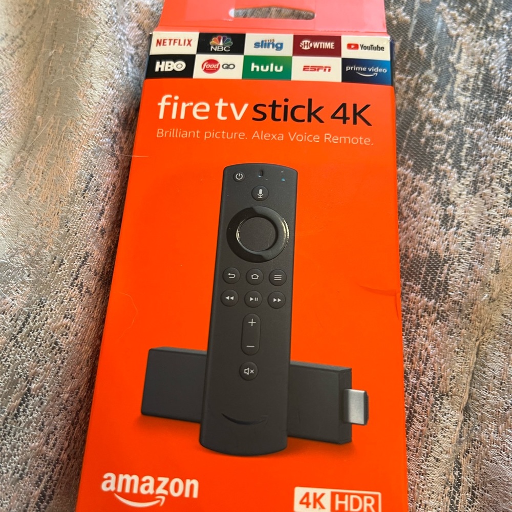 Fire TV Stick 4K streaming device with latest Alexa Voice Remote